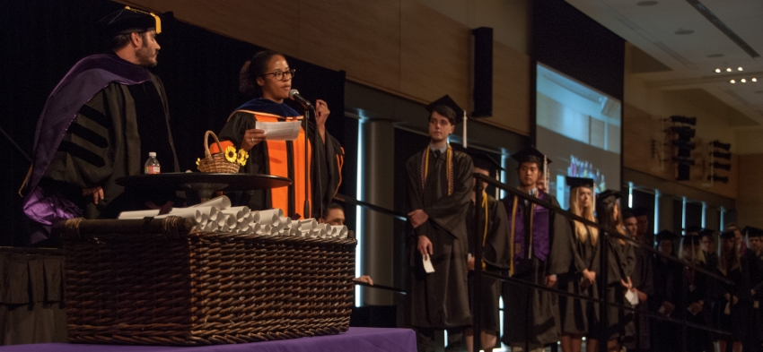 Prof. Megan Ming Francis announcing undergraduates 