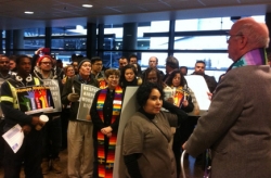Religious leaders and workers gather at Sea-Tac International Airport, courtesy reclaimtheamericandream.org.