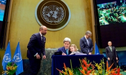 Signing of Paris Agreement on Climate Change. U.S. Secretary of State John Kerry, with his two-year-old granddaughter Isabelle