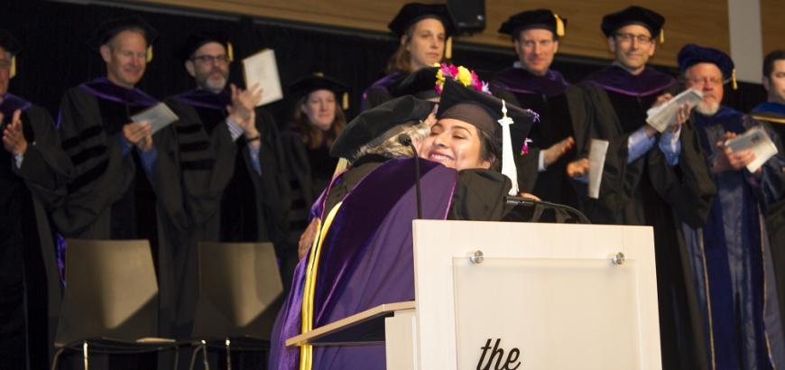 Student receiving award